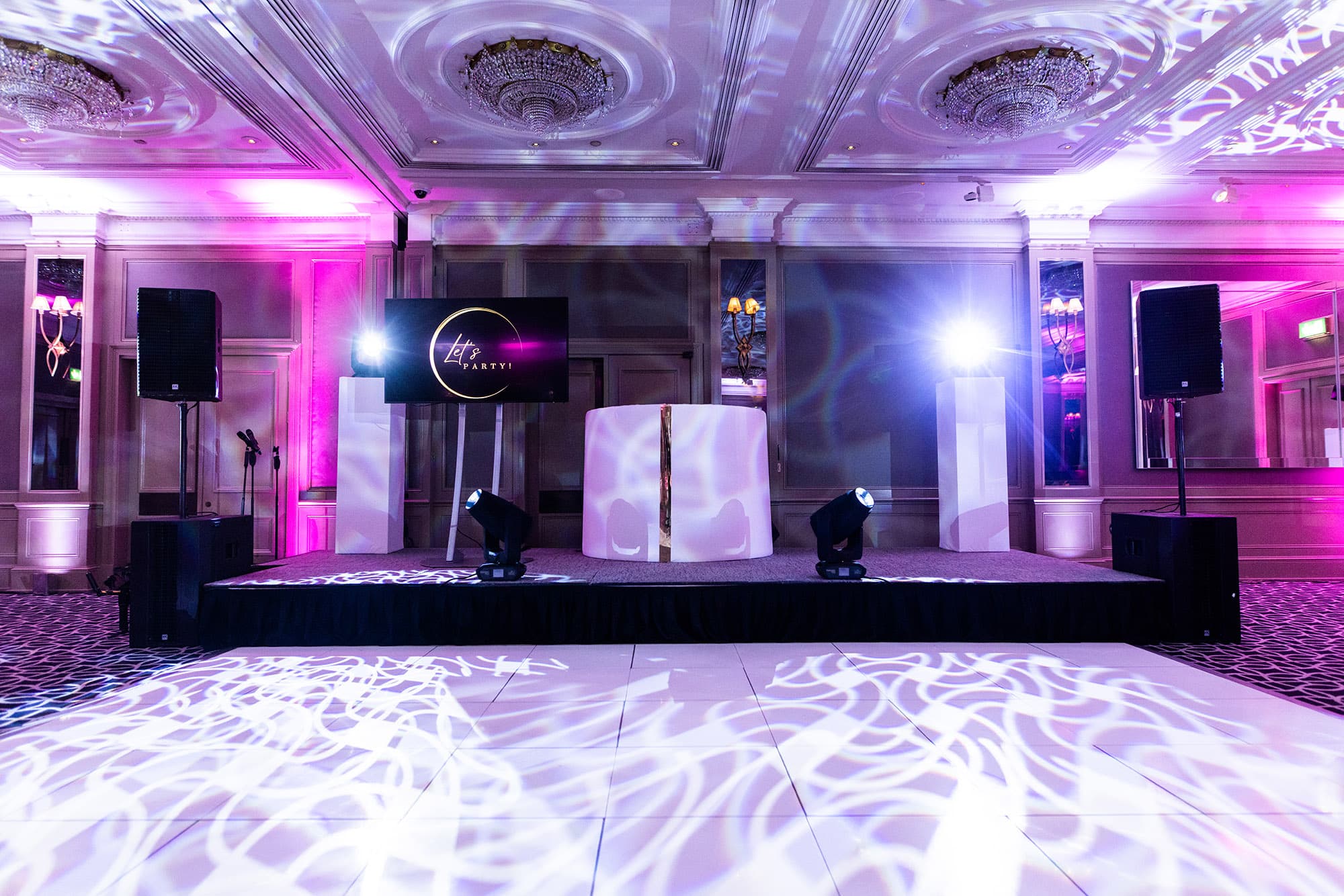 Professional DJ booth with premium sound system and intelligent lighting